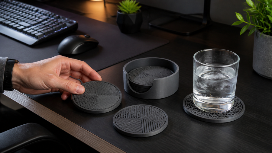 Generic geometric 3D printed coasters and holder on a gaming desk
