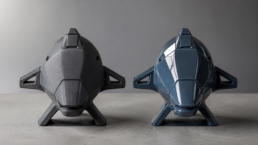 Side-by-side matte and gloss 3D printed geometric models under studio light