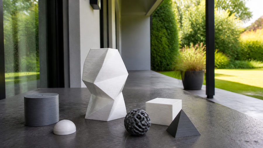 Generic 3D printed material samples on a sheltered outdoor table